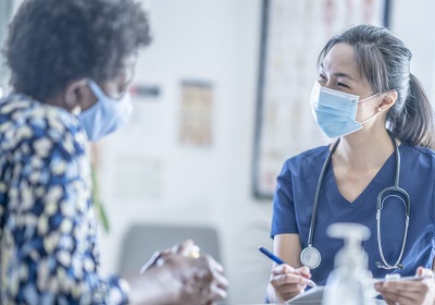Bupa Cromwell – image of clinician and patient talking
