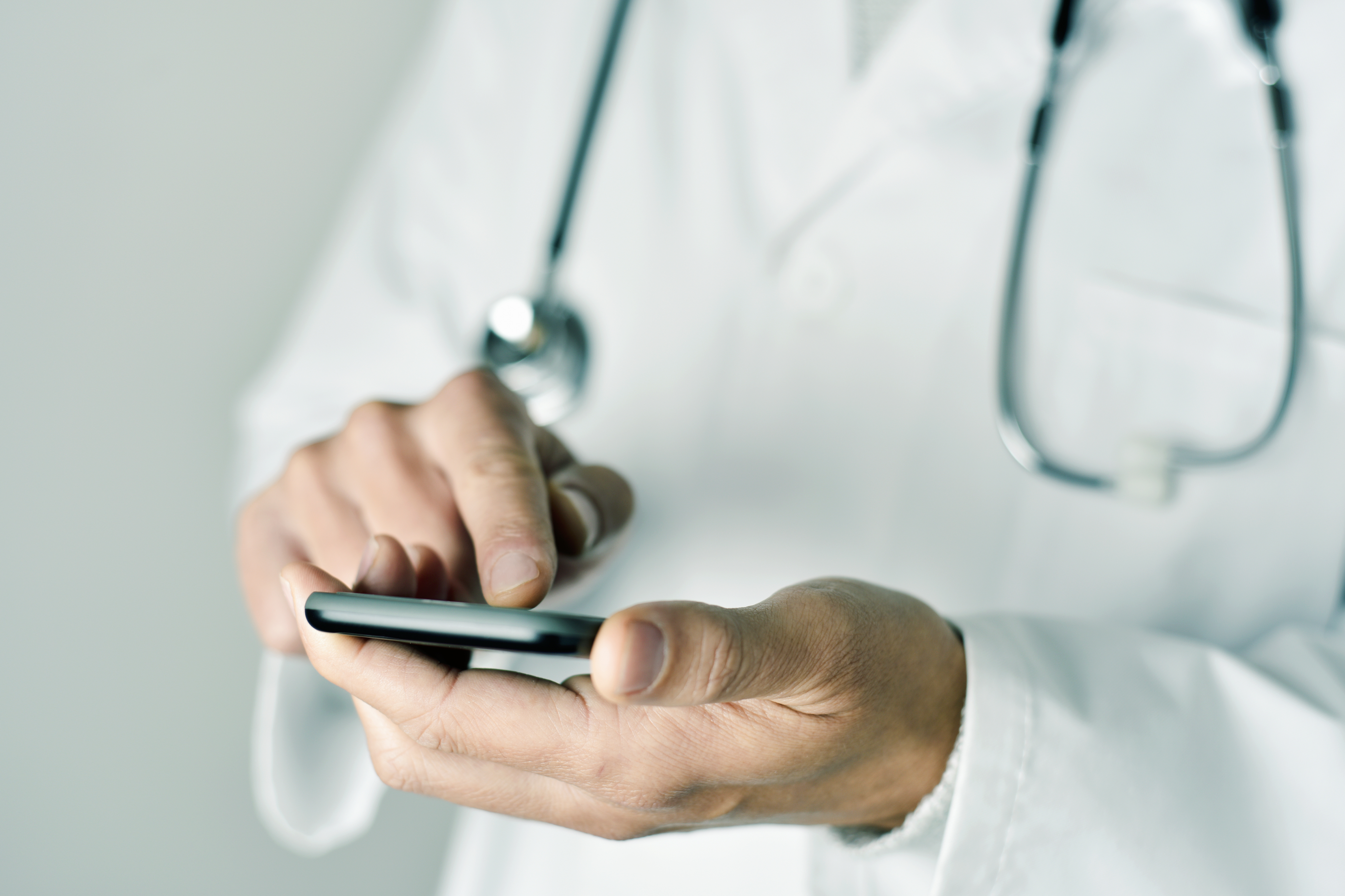 Bupa Cromwell – image of clinician using mobile app